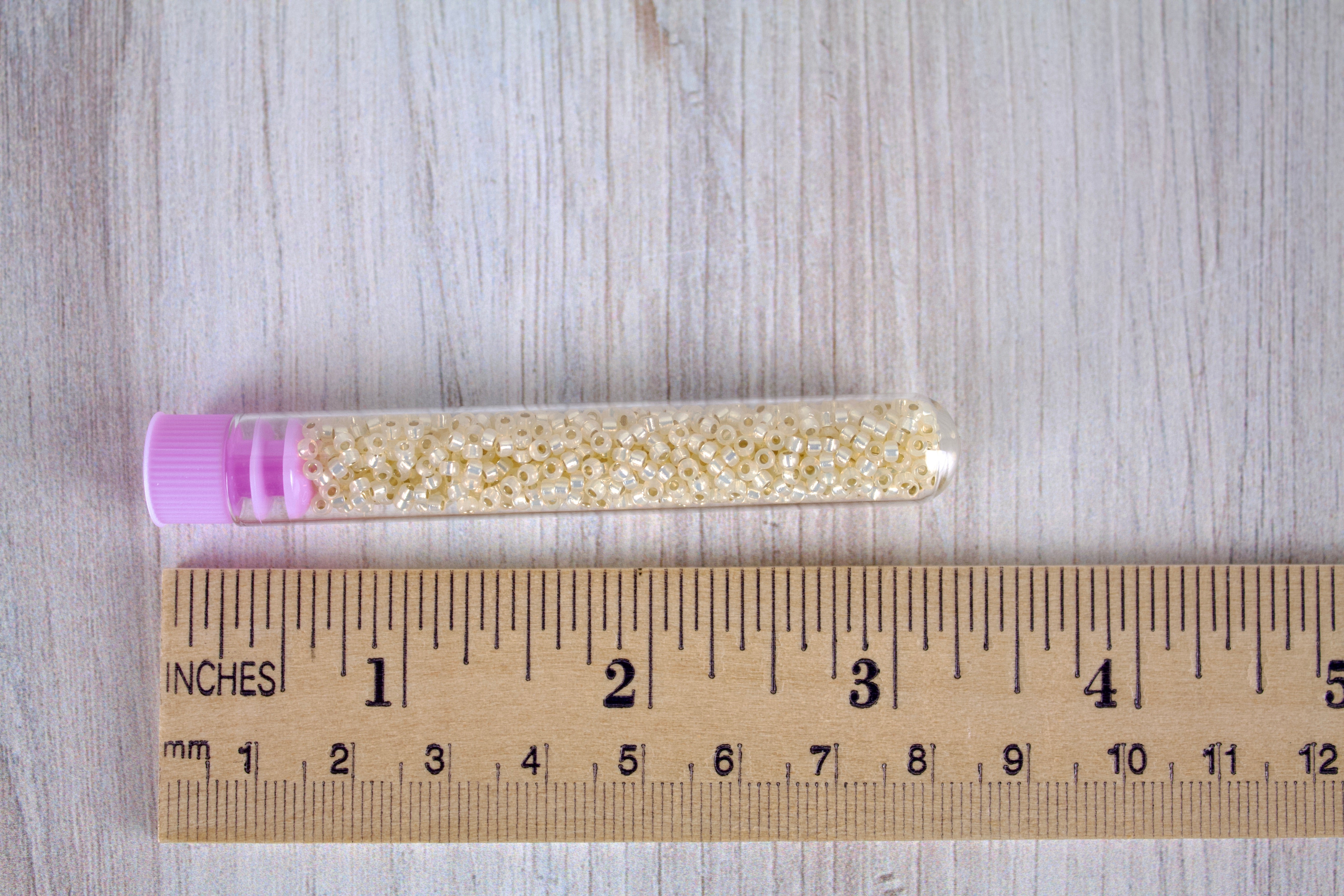 Buttercream Lined Alabaster Miyuki Seed Beads size 11