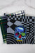 Head Trip Potholder-The Blue Peony-Category_Pot Holder,Color_Black,Color_Yellow,Department_Kitchen,Size_Traditional (Square),Theme_Halloween