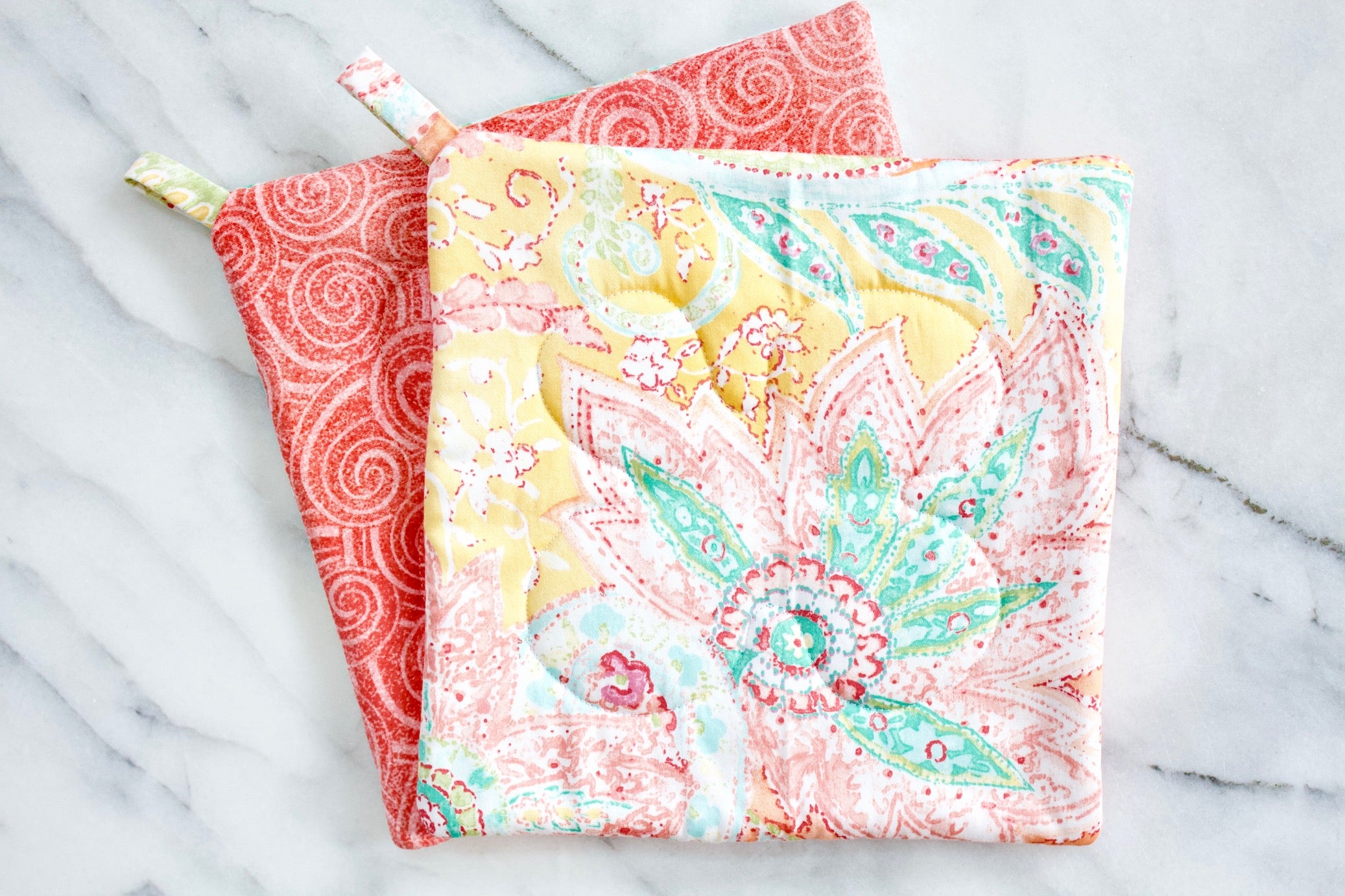 Paisley Sunrise Potholder-The Blue Peony-Category_Pot Holder,Color_Cream,Color_Orange,Color_Pink,Color_Yellow,Department_Kitchen,Pattern_Paisley,Size_Traditional (Square)