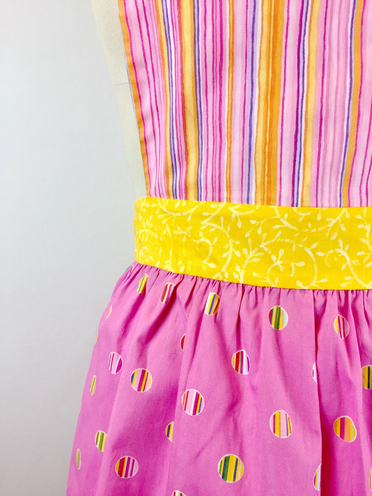 Pretty in Pink Apron-The Blue Peony-Age Group_Adult,Apron Style_Vintage Feminine,Category_Apron,Color_Pink,Color_Yellow,Department_Kitchen,Material_Cotton,Pattern_Polka Dot,Pattern_Stripes