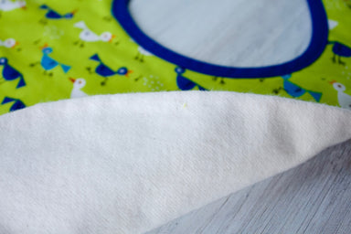 Bitsy the Bird Bib-The Blue Peony-Animal_Bird,Category_Bib,Color_Blue,Color_Lime Green,Department_Organic Baby,Material_Organic Cotton,Pattern_Ed Emberley's Animals,Theme_Animal