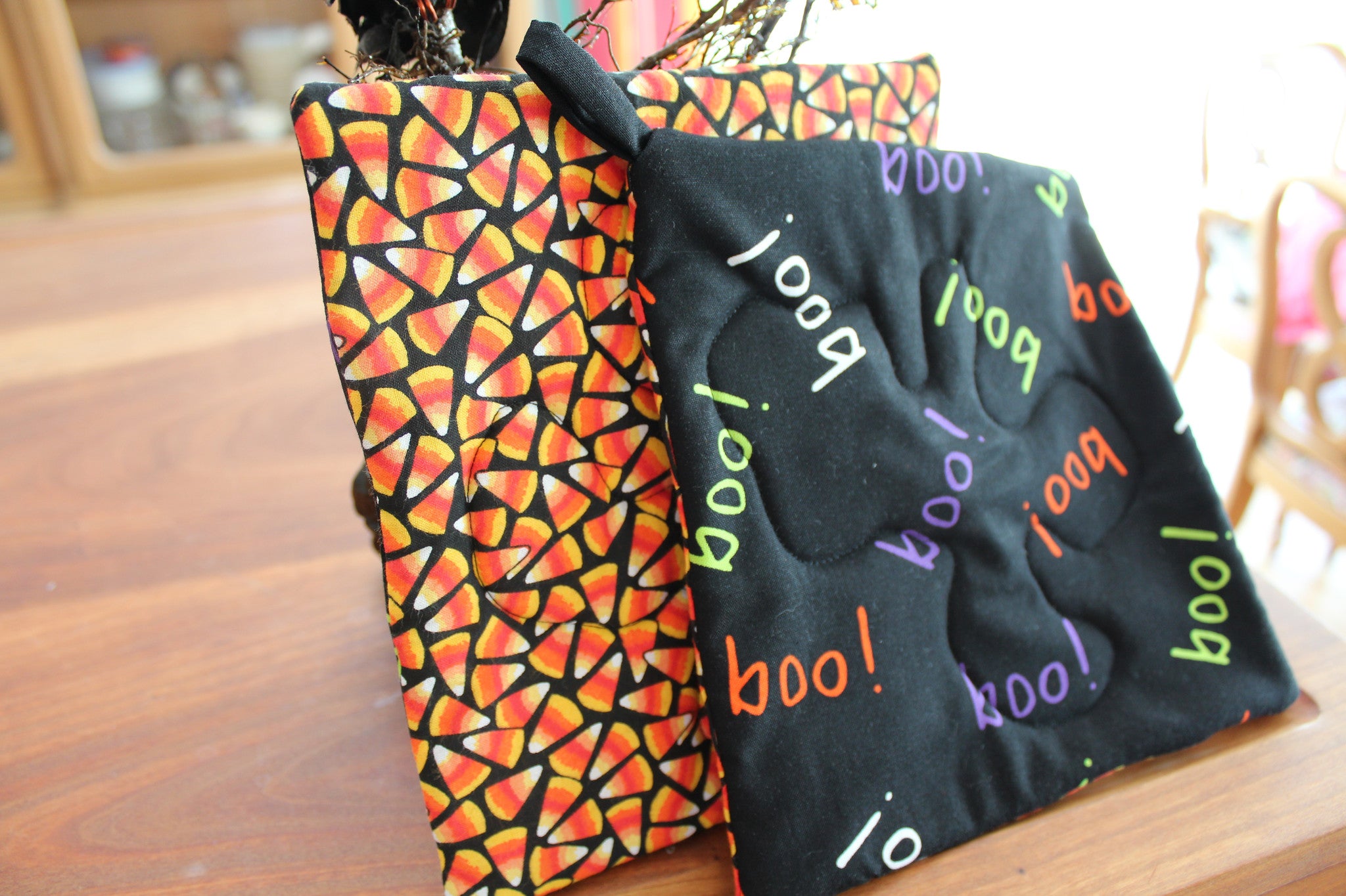 Candy Corn Boo! Potholder-The Blue Peony-Category_Pot Holder,Color_Black,Color_Orange,Department_Kitchen,Size_Traditional (Square),Theme_Food,Theme_Halloween