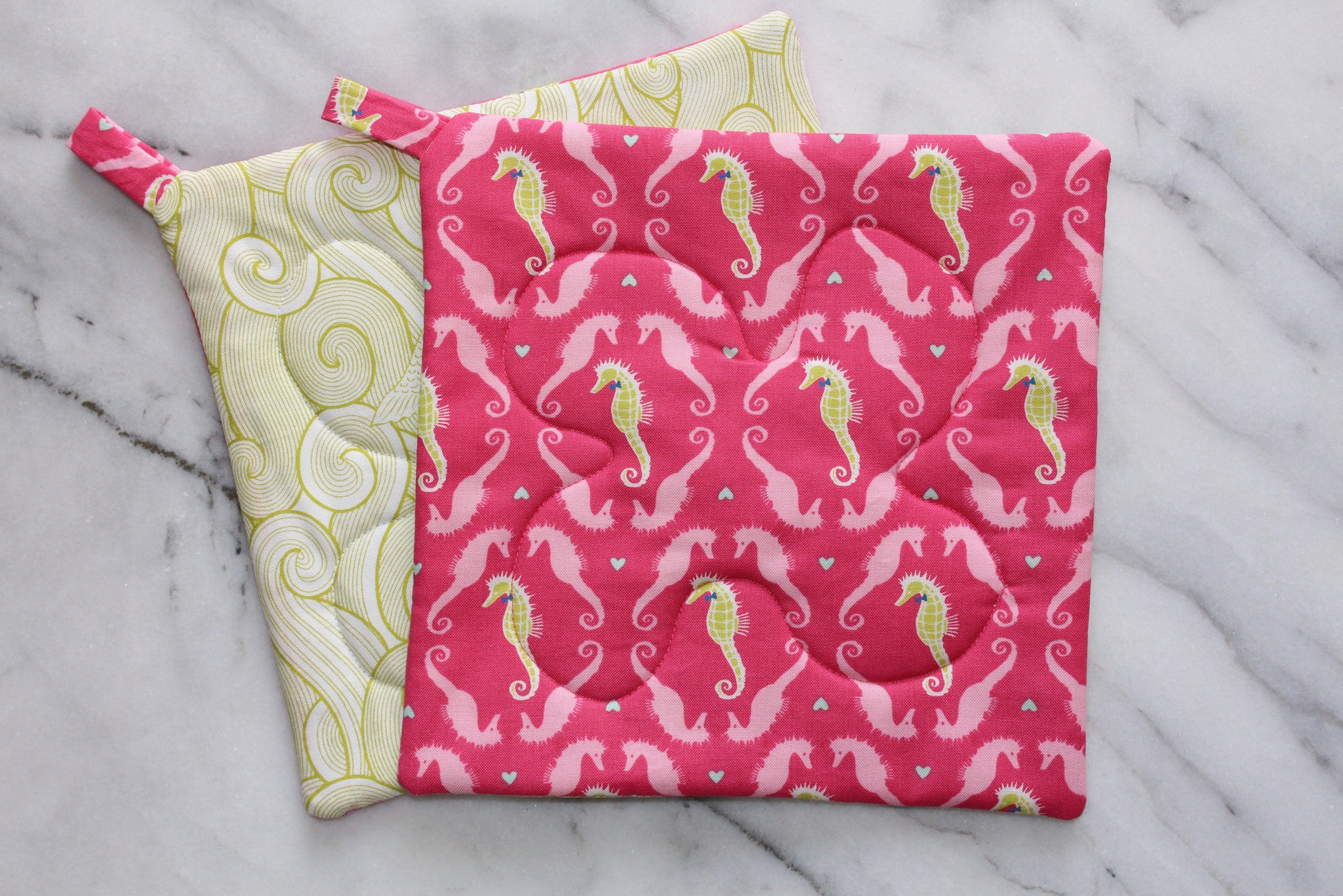 Dapper Seahorses Potholder-The Blue Peony-Animal_Seahorse,Category_Pot Holder,Color_Lime Green,Color_Pink,Department_Kitchen,Size_Traditional (Square),Theme_Animal,Theme_Water Life