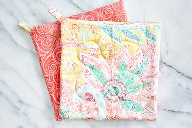 Paisley Sunrise Potholder-The Blue Peony-Category_Pot Holder,Color_Cream,Color_Orange,Color_Pink,Color_Yellow,Department_Kitchen,Pattern_Paisley,Size_Traditional (Square)
