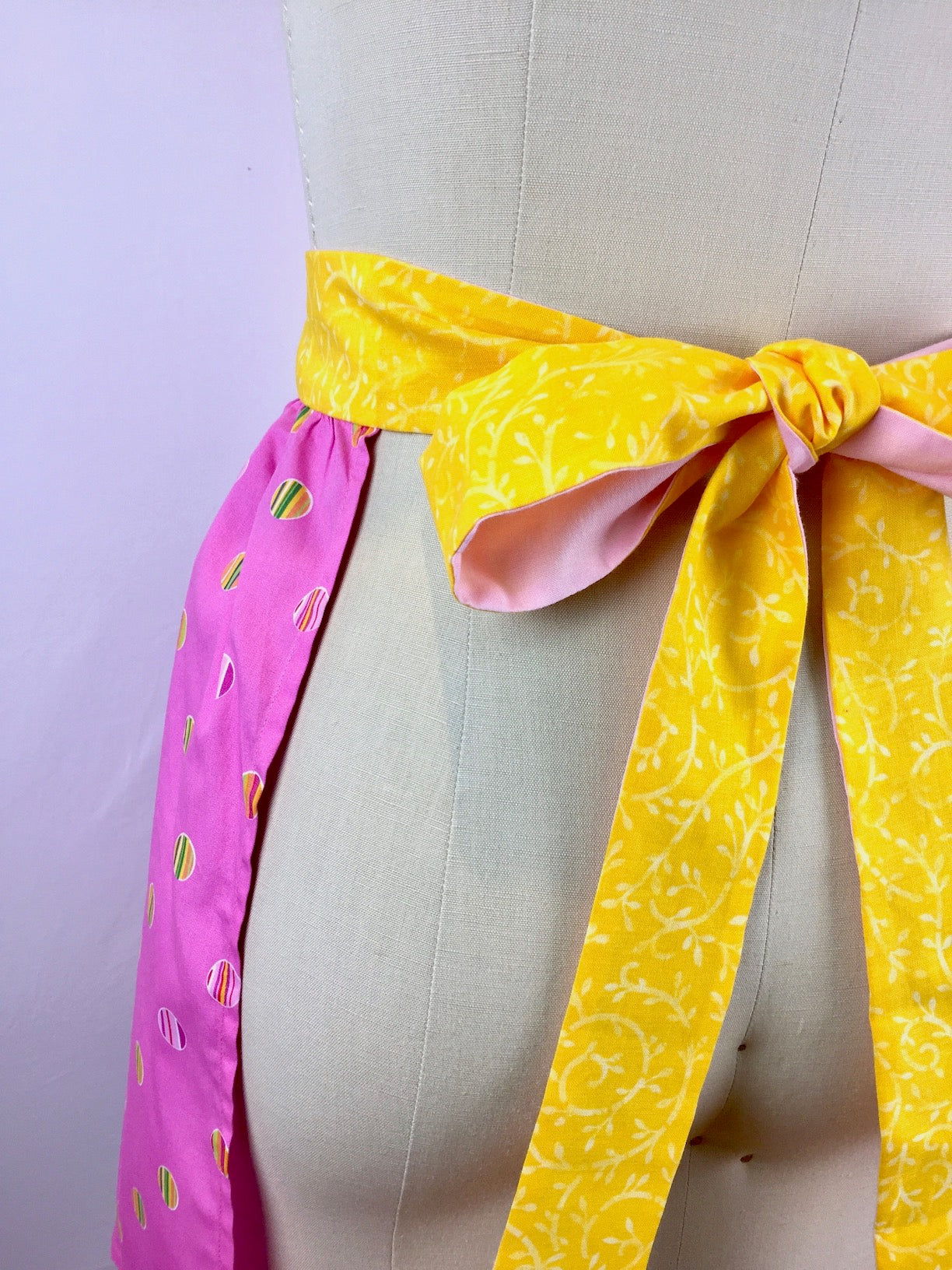 Pretty in Pink Apron-The Blue Peony-Age Group_Adult,Apron Style_Vintage Feminine,Category_Apron,Color_Pink,Color_Yellow,Department_Kitchen,Material_Cotton,Pattern_Polka Dot,Pattern_Stripes