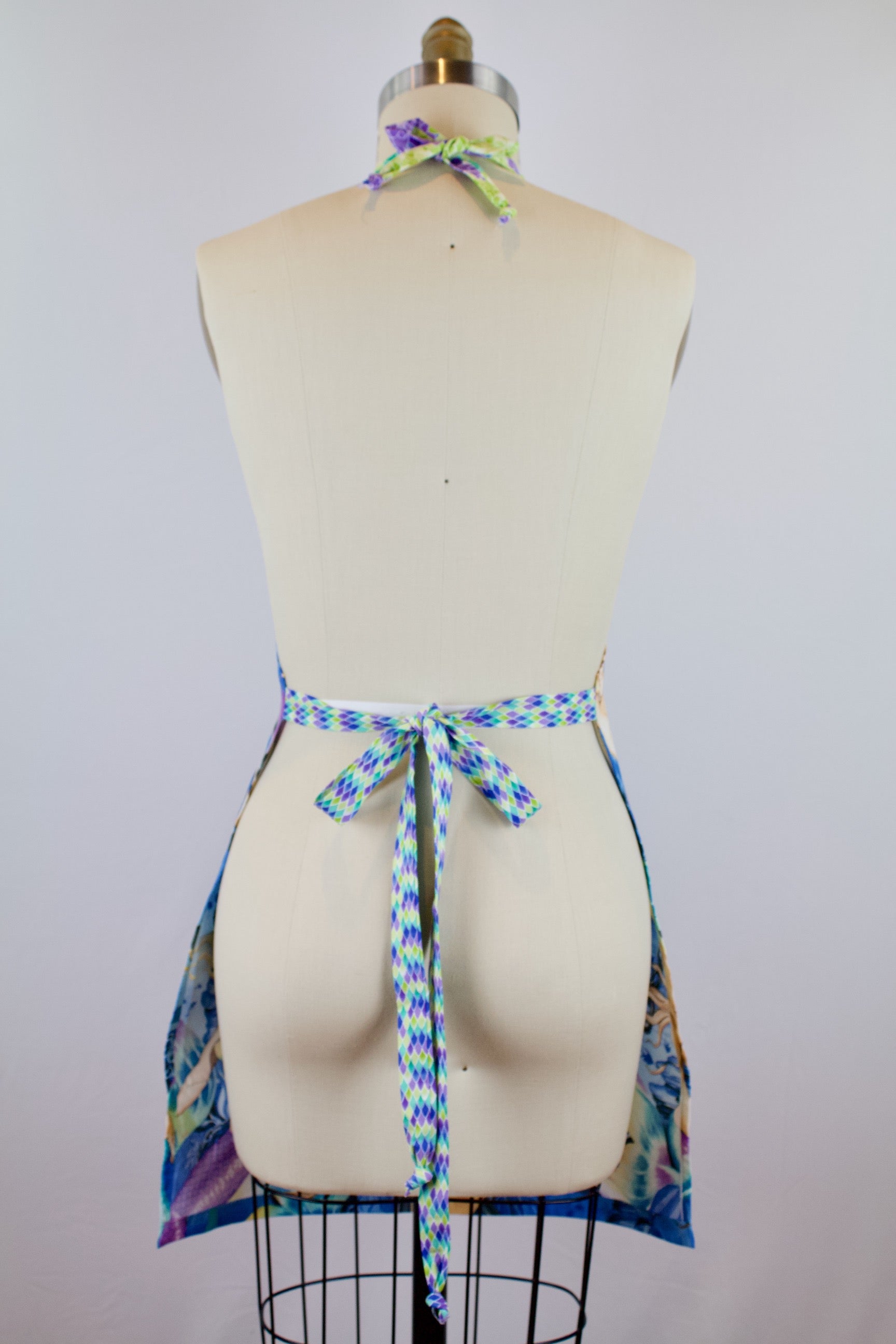 Sea Sirens Mermaid Apron-The Blue Peony-Age Group_Adult,Animal_Mermaid,Apron Style_Chef,Category_Apron,Color_Aqua,Color_Purple,Color_Teal,Department_Kitchen,Material_Cotton,Theme_Hunks,Theme_Summer,Theme_Tropical,Theme_Water Life