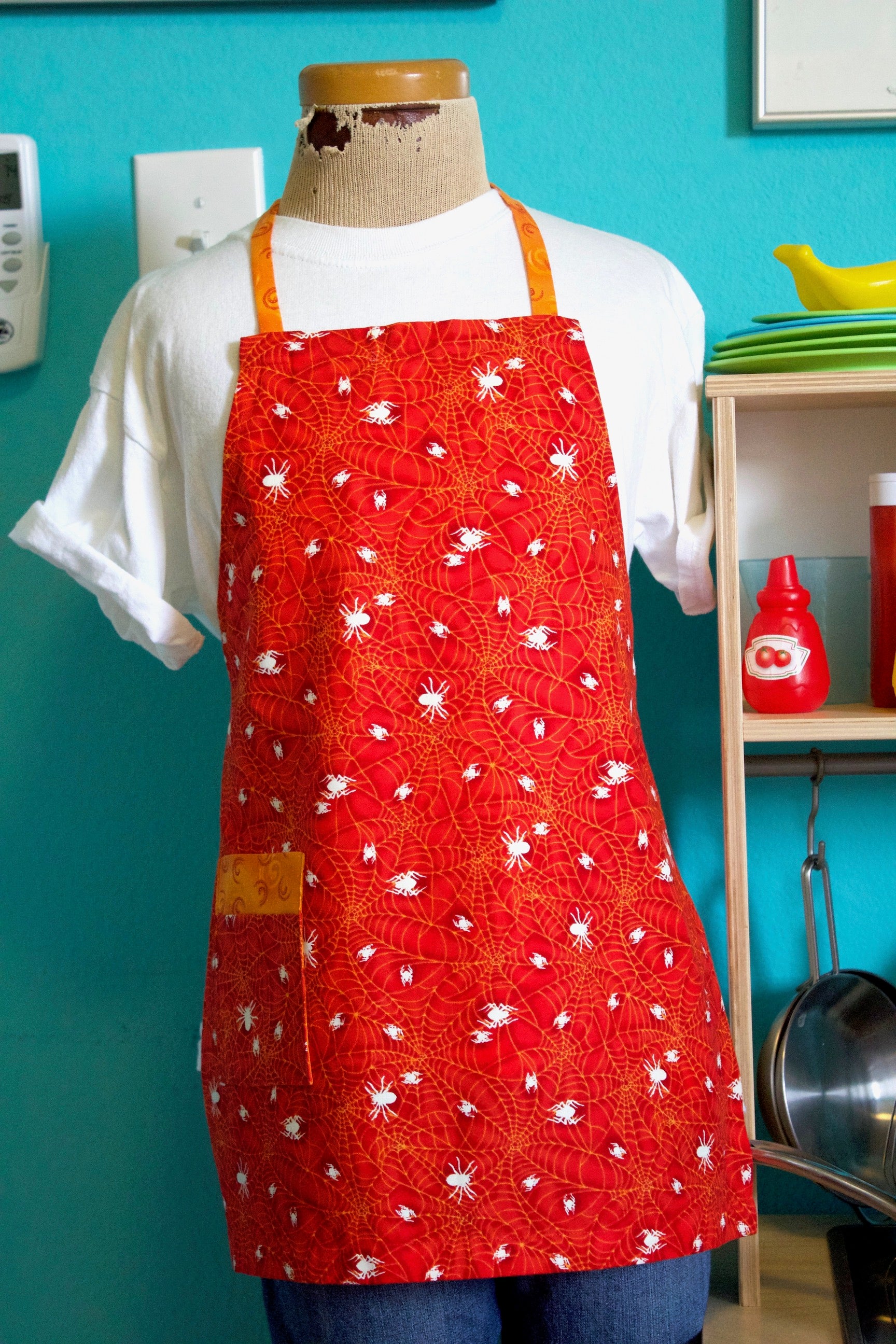 Spider's Web Kid's Apron - Red-The Blue Peony-Age Group_Kids,Category_Apron,Color_Red,Department_Kitchen,Material_Cotton,Size_Small (ages up to 5),Theme_Animal,Theme_Fall,Theme_Halloween