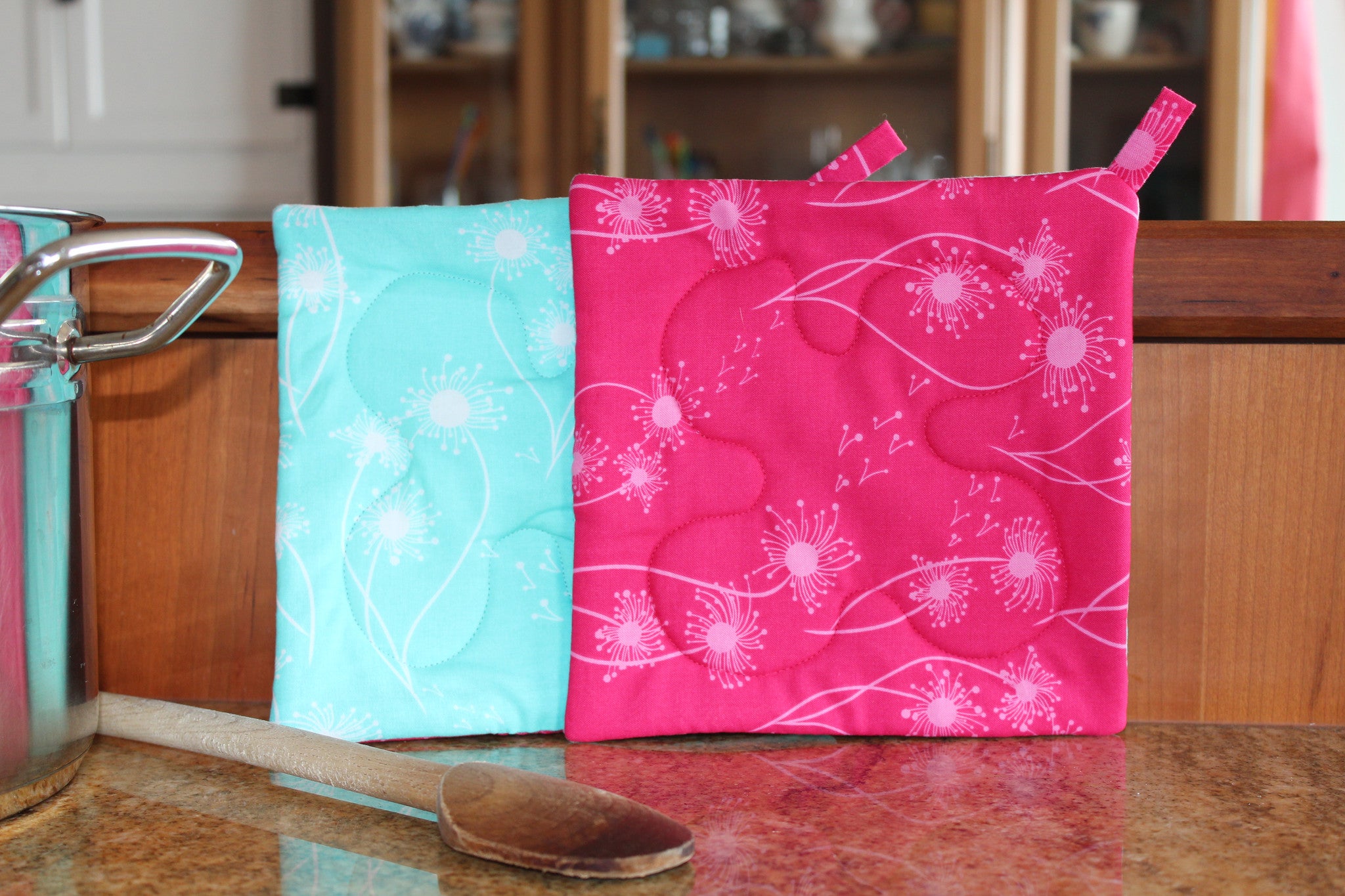 Spring into Summer Dandelions Potholder-The Blue Peony-Category_Pot Holder,Color_Aqua,Color_Pink,Department_Kitchen,Pattern_Floral,Size_Traditional (Square),Theme_Spring,Theme_Summer