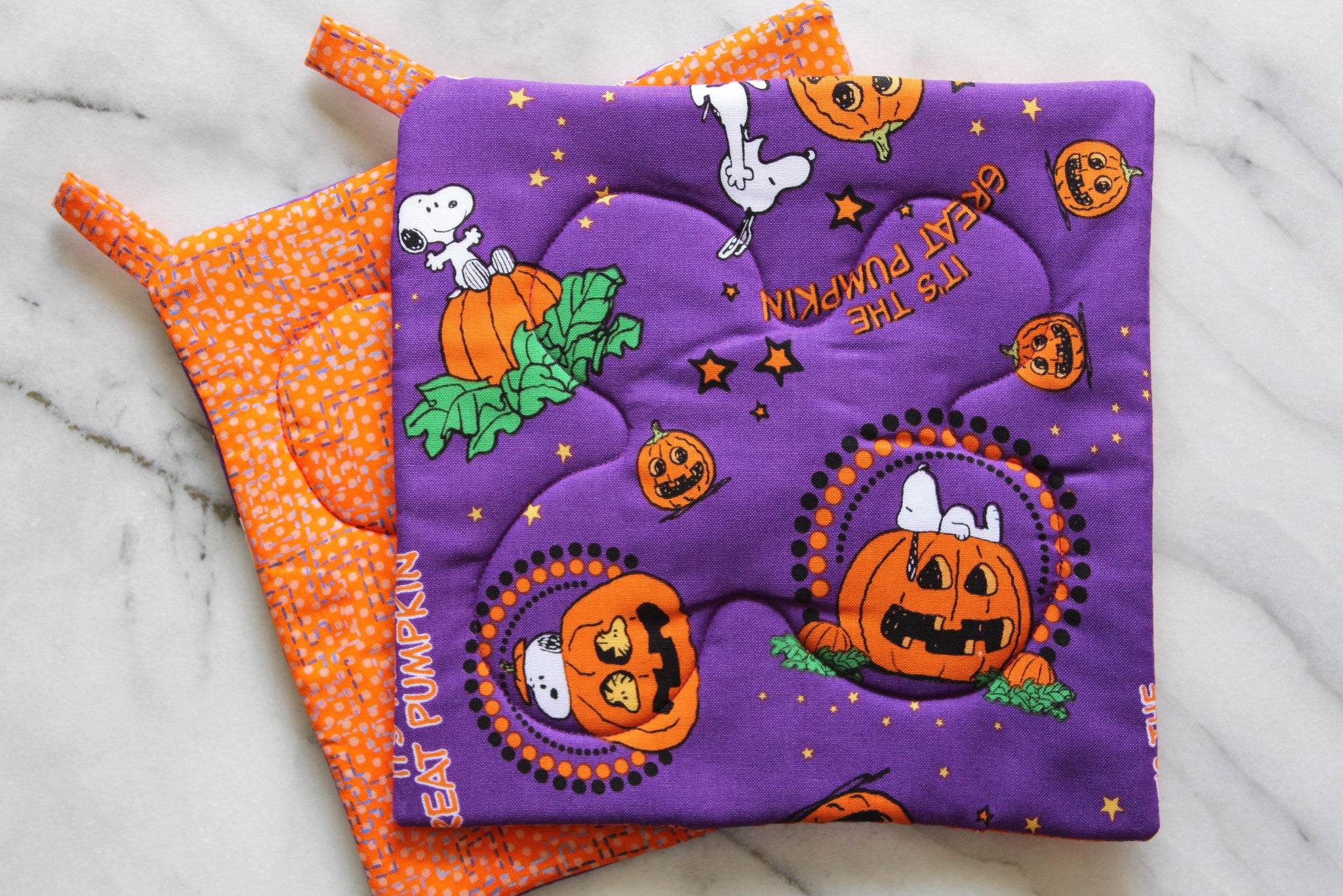 Snoopy and The Great Pumpkin Potholder-The Blue Peony-Animal_Dog,Category_Pot Holder,Color_Orange,Color_Purple,Department_Kitchen,Size_Traditional (Square),Theme_Fall,Theme_Halloween